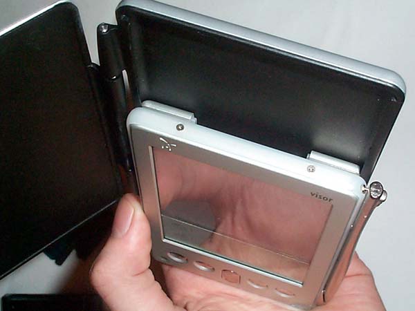  has an upcoming slim case that uses the track to attach the Visor Edge.